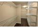 Large walk-in closet with lots of wire shelving to maximize space at 7165 Winthrop Rd, Alpharetta, GA 30005