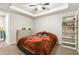 Bedroom featuring carpet, shelving, a dresser and decor at 1366 Maple Ridge Dr, Suwanee, GA 30024