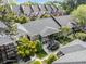 Aerial view showcasing well-maintained townhomes with lush landscaping, creating a peaceful residential setting at 3675 Peachtree Ne Rd # 9, Atlanta, GA 30319