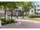 Welcoming entrance sign for Orleans with automatic gates, surrounded by lush greenery and brick landscaping at 3675 Peachtree Ne Rd # 9, Atlanta, GA 30319