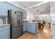Updated kitchen boasting stainless steel appliances, and blue cabinets for a sleek design at 3675 Peachtree Ne Rd # 9, Atlanta, GA 30319