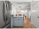 The kitchen features modern amenities and views into the dining room for easy access at 3675 Peachtree Ne Rd # 9, Atlanta, GA 30319