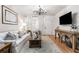 Stylish living room with hardwood floors, modern furnishings, and natural light at 3675 Peachtree Ne Rd # 9, Atlanta, GA 30319
