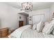 Bright bedroom features hardwood floors, white walls, and stylish decor for a peaceful retreat at 3675 Peachtree Ne Rd # 9, Atlanta, GA 30319