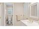 Clean bathroom showcasing a single sink vanity, white cabinets, and bright natural lighting at 3720 Bridle Ridge Dr, Suwanee, GA 30024