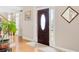 Inviting foyer with hardwood floors, decorative front door, and natural light at 3720 Bridle Ridge Dr, Suwanee, GA 30024