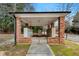 Community mailboxes featuring brick columns with a concrete walkway at 11112 Benton Woods Dr, Covington, GA 30014