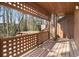 Private balcony with a wood-slat floor and decorative railing, offering a peaceful outdoor space at 1668 Terrell Ridge Se Dr, Marietta, GA 30067