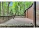 Large wooden deck with railing, offering outdoor living space and natural views at 1668 Terrell Ridge Se Dr, Marietta, GA 30067