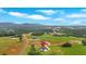 Expansive aerial shot displays lush green landscape with new construction home nestled in a serene, picturesque setting at 300 Eminence Peak, Rydal, GA 30171