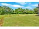 Large, well-manicured backyard offering plenty of space for outdoor activities at 300 Eminence Peak, Rydal, GA 30171