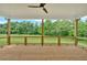 Rear deck features wood floors, natural surroundings, and wooden railing at 300 Eminence Peak, Rydal, GA 30171