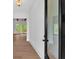 Bright foyer features wood floors, white walls, and a clear view to the backyard at 300 Eminence Peak, Rydal, GA 30171