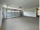 Spacious garage with an automatic door and plenty of room for vehicle parking and storage at 300 Eminence Peak, Rydal, GA 30171