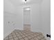 Laundry room featuring decorative tiled floor at 300 Eminence Peak, Rydal, GA 30171