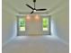 Bright main bedroom with recessed lighting and great natural light from the windows at 300 Eminence Peak, Rydal, GA 30171
