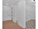 Mudroom featuring patterned tile floors, white walls, and utility sink at 300 Eminence Peak, Rydal, GA 30171