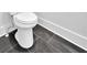 Clean bathroom with black tile floors and modern toilet at 300 Eminence Peak, Rydal, GA 30171