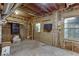 Unfinished basement with exposed beams, block foundation, and abundant potential at 4092 Deerbrook Sw Way, Lilburn, GA 30047
