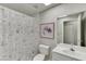 Tidy bathroom with patterned shower curtain, white fixtures, and clean vanity for a fresh feel at 4092 Deerbrook Sw Way, Lilburn, GA 30047