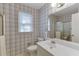 Bathroom featuring neutral walls, a bright vanity, and enclosed shower stall at 4092 Deerbrook Sw Way, Lilburn, GA 30047
