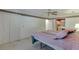 Comfortable bedroom with large closet and ceiling fan, conveniently located near the Primary bath at 4092 Deerbrook Sw Way, Lilburn, GA 30047