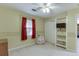 Neutral bedroom featuring carpet, single window, and decorative elements at 4092 Deerbrook Sw Way, Lilburn, GA 30047