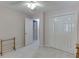 Neutral bedroom featuring carpet, double closets, and hallway access at 4092 Deerbrook Sw Way, Lilburn, GA 30047