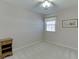 Neutral bedroom featuring carpet, single window, and decorative elements at 4092 Deerbrook Sw Way, Lilburn, GA 30047
