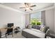 Bedroom with a desk, a window with curtains, and a comfortable gray sofa at 5775 Stellata Cir, Cumming, GA 30028
