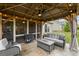Inviting outdoor space with stylish furniture and views of a beautiful garden at 5775 Stellata Cir, Cumming, GA 30028