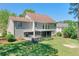 This backyard features a putting green, sand trap and partially covered deck that's perfect for outdoor enjoyment at 630 Silverberry Ln, Sugar Hill, GA 30518