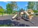 Fun community playground with slides, swings, and climbing structures for children to enjoy at 630 Silverberry Ln, Sugar Hill, GA 30518