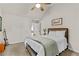 Cozy bedroom with vaulted ceilings, soft carpet and natural light at 1212 Overlook Lake Dr, Dacula, GA 30019