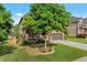 Attractive brick home with covered porch and lush landscaping creating a welcoming curb appeal at 1212 Overlook Lake Dr, Dacula, GA 30019