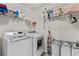 Laundry room featuring modern washer and dryer at 1212 Overlook Lake Dr, Dacula, GA 30019