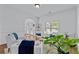 Bright living room with hardwood floors, white chairs, an arched entry and lots of natural light at 1212 Overlook Lake Dr, Dacula, GA 30019