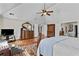 This spacious bedroom features a large rug, hardwood floors, and neutral decor at 1212 Overlook Lake Dr, Dacula, GA 30019