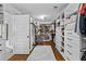 Spacious walk-in closet with custom shelving, storage, and lots of hanging space at 1212 Overlook Lake Dr, Dacula, GA 30019