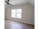 Bright bedroom boasts hardwood floors, vaulted ceilings, and abundant natural light at 1415 Coretta Bnd, Atlanta, GA 30318