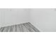 Room showing luxury vinyl flooring with a gray wood grain look at 1482 Connally Sw Ave, Atlanta, GA 30310