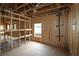 Home under construction showing open floor plan and framing of electrical and access to natural light at 251 Strawberry Ln, Woodstock, GA 30189
