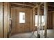Interior framing of a room with electrical, plumbing and window placement and access at 251 Strawberry Ln, Woodstock, GA 30189