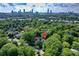 Aerial view of home in Atlanta, GA, surrounded by lush greenery, highlighting its prime location at 872 Euclid Ne Ave, Atlanta, GA 30307