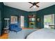 Bedroom with fireplace, seating, and adjacent balcony at 872 Euclid Ne Ave, Atlanta, GA 30307
