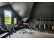 Attic bonus room featuring guitars, sound equipment, and natural light for creative expression at 872 Euclid Ne Ave, Atlanta, GA 30307
