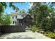 Charming home with stone patio, lush landscaping, and stylish exterior, perfect for enjoying the outdoors at 872 Euclid Ne Ave, Atlanta, GA 30307