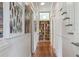 Hallway view of built-in bookshelf at the end at 872 Euclid Ne Ave, Atlanta, GA 30307