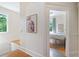 Hallway with access to a bedroom with a view out the windows at 872 Euclid Ne Ave, Atlanta, GA 30307