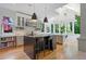 Open kitchen with a large island, modern appliances, and adjacent breakfast nook at 872 Euclid Ne Ave, Atlanta, GA 30307